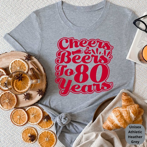 Cheers & Beers to 80 Years! Celebrate a Lifetime of Memories with Our Customizable 80th Birthday Shirt