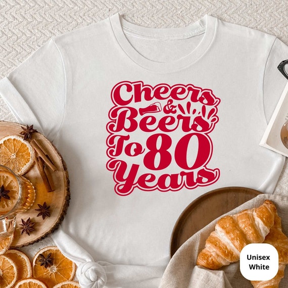Cheers & Beers to 80 Years! Celebrate a Lifetime of Memories with Our Customizable 80th Birthday Shirt