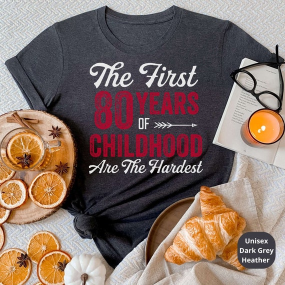 The First 80 Years of Childhood Are The Hardest! Celebrate a Lifetime of Memories with Our Funny 80th Birthday Shirt